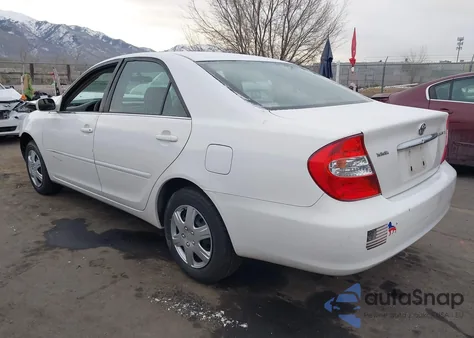 2003 Toyota Camry Le z USA, uszkodzony, nr VIN JTDBE32K830168032